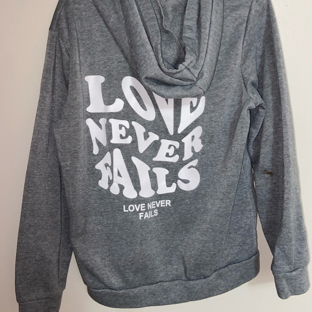 grey love never fails hoodie